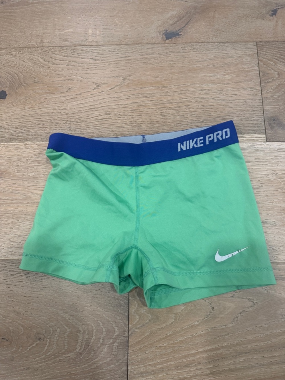 Nike Green Compression Shorts with Blue Waistband